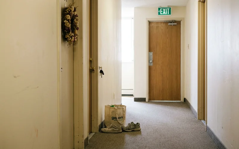 Cleared apartment hallway with an unobstructed exit