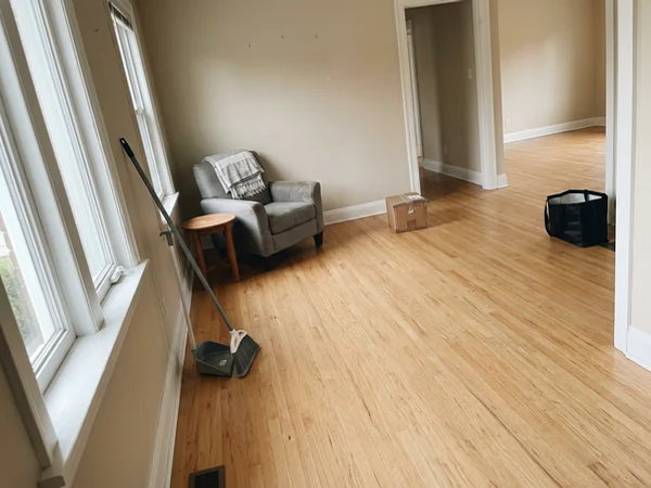 Empty, swept living room after the final haul
