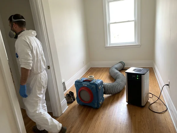 HEPA air scrubber and hydroxyl generator running in a cleaned room
