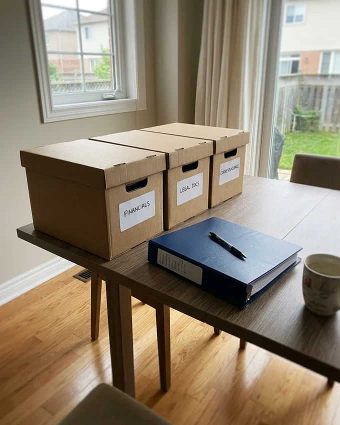 Labelled document boxes and an inventory binder for probate records