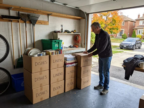 Sorted donation boxes in a clean garage